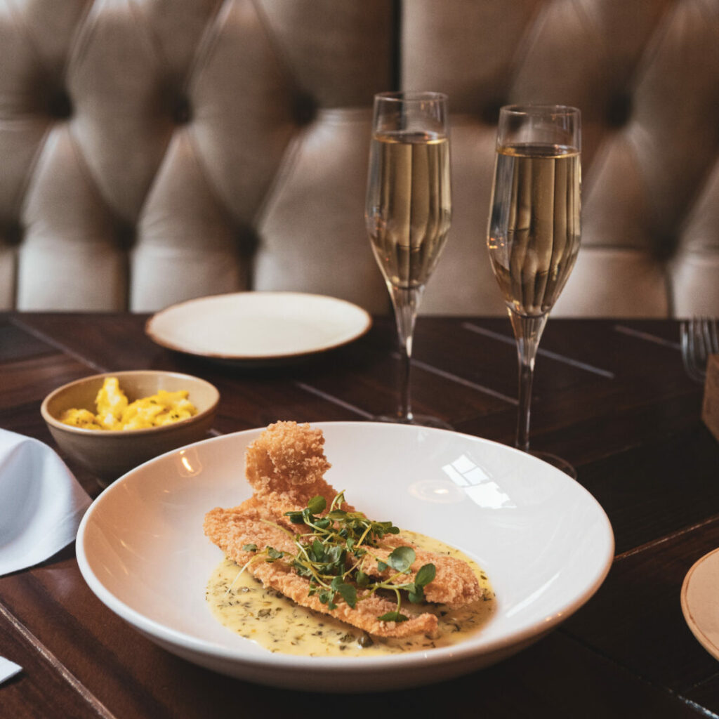 Complimentary glass of fizz, Dobson & Parnell